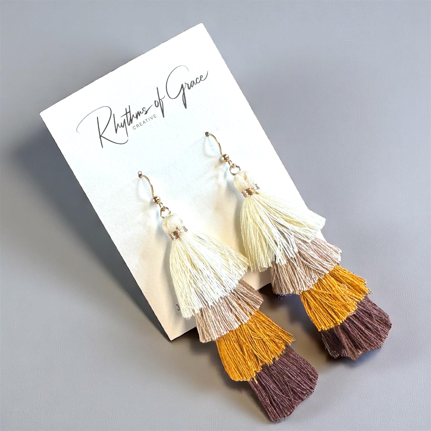 Boho Babe Alert! Tiered Tassel Earrings - Neutral Chic
