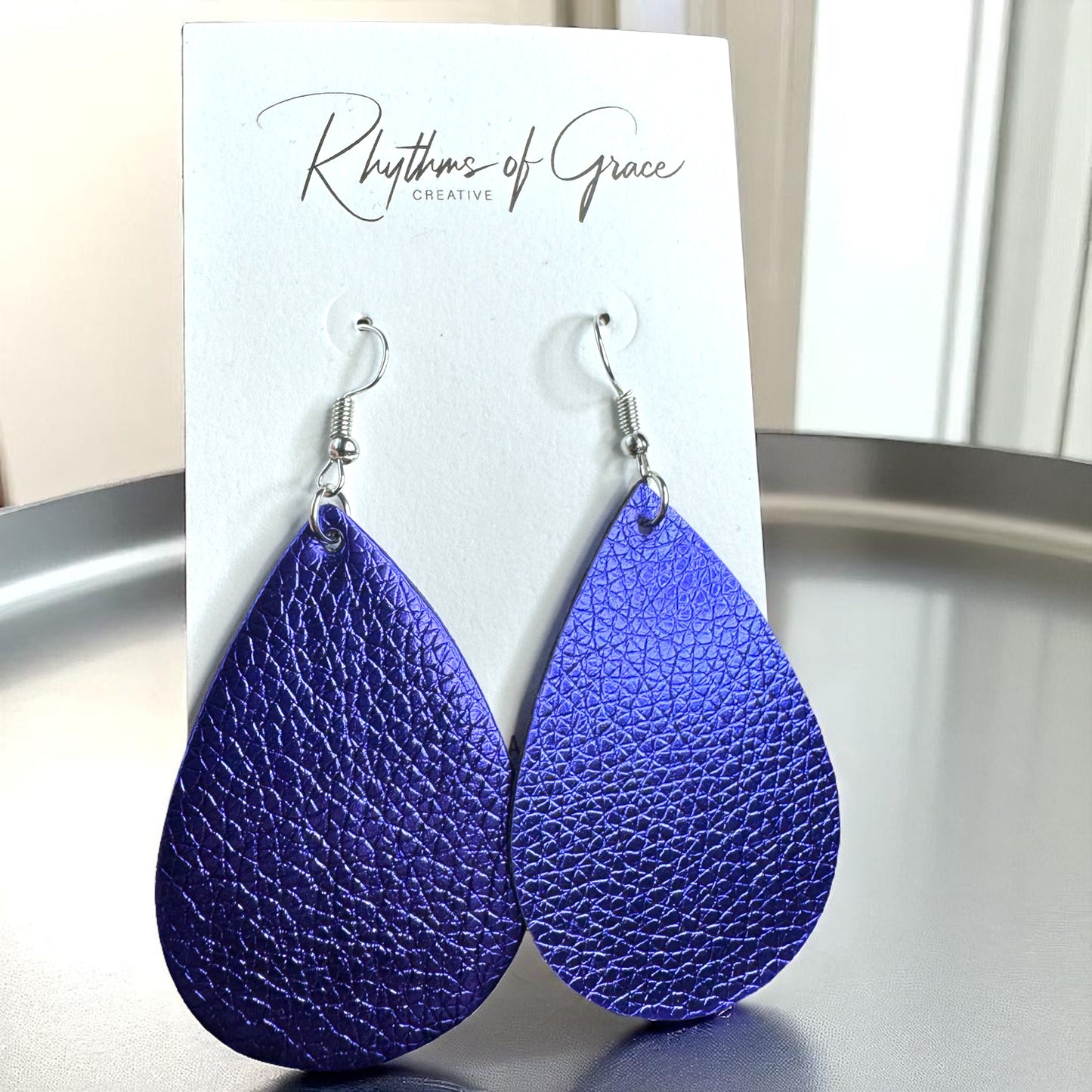Sparkle & Shine: Metallic Teardrop Faux Leather Earrings! 🌟
