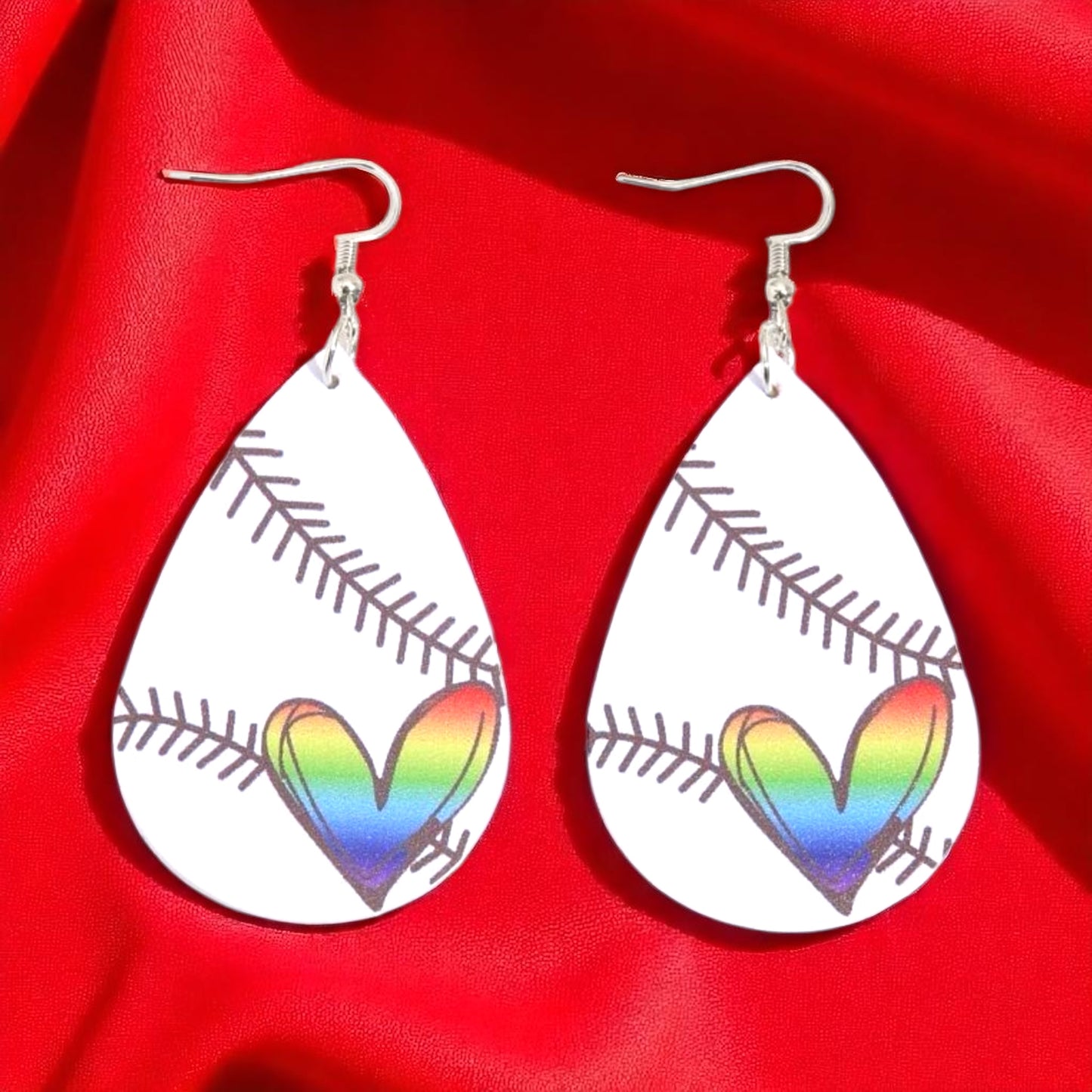 Swing into Style with Our Rainbow Heart Baseball Dangle Earrings! ⚾️🏳️‍🌈