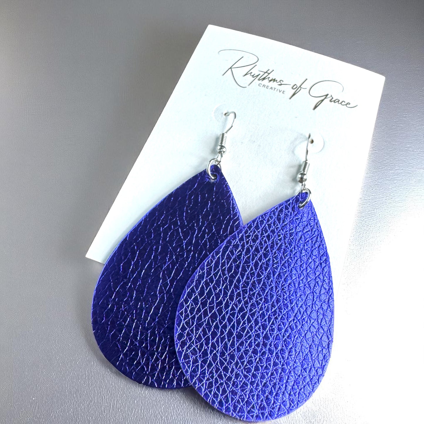 Sparkle & Shine: Metallic Teardrop Faux Leather Earrings! 🌟