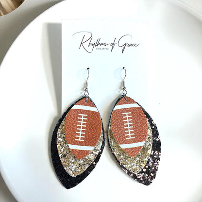 Game Day Glam: Black and Gold Glitter Football Earrings for the Ultimate Fan!