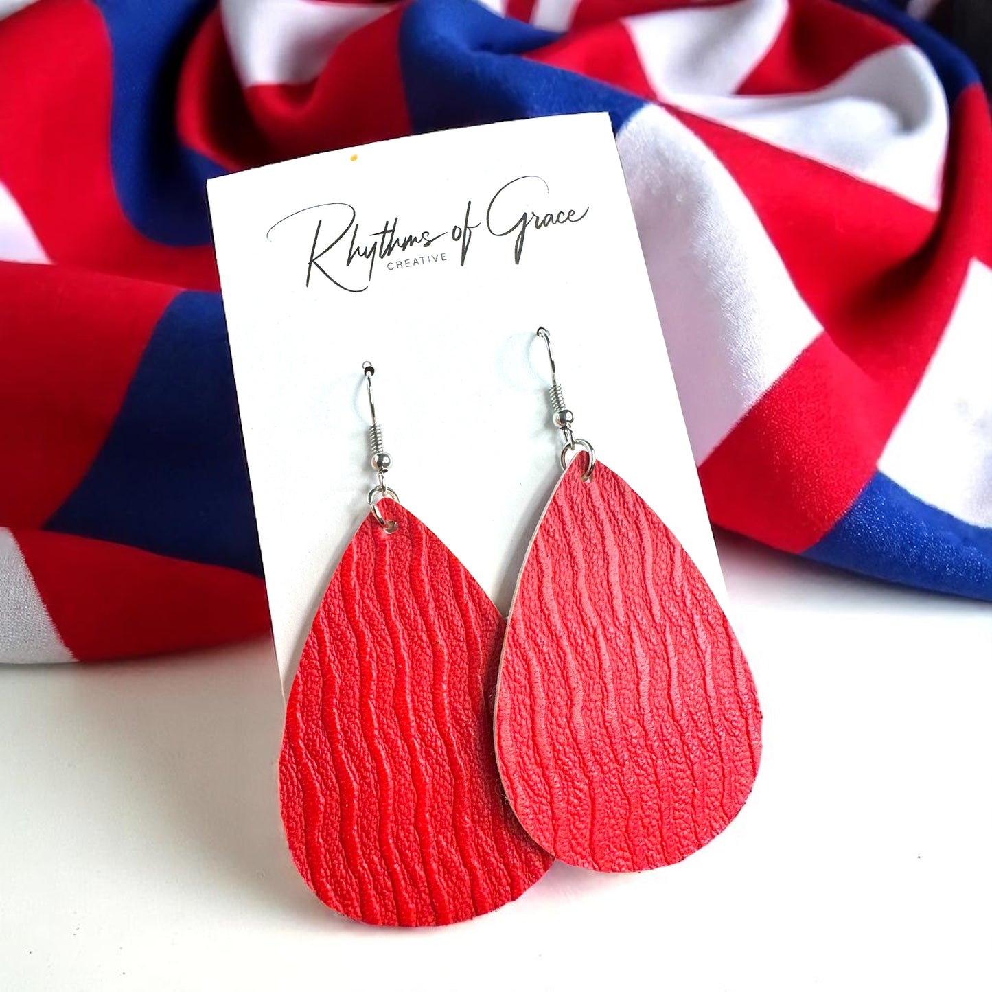 Teardrop Treasures: Red & Blue Faux Leather Dangle Earrings for Ultimate Style!
