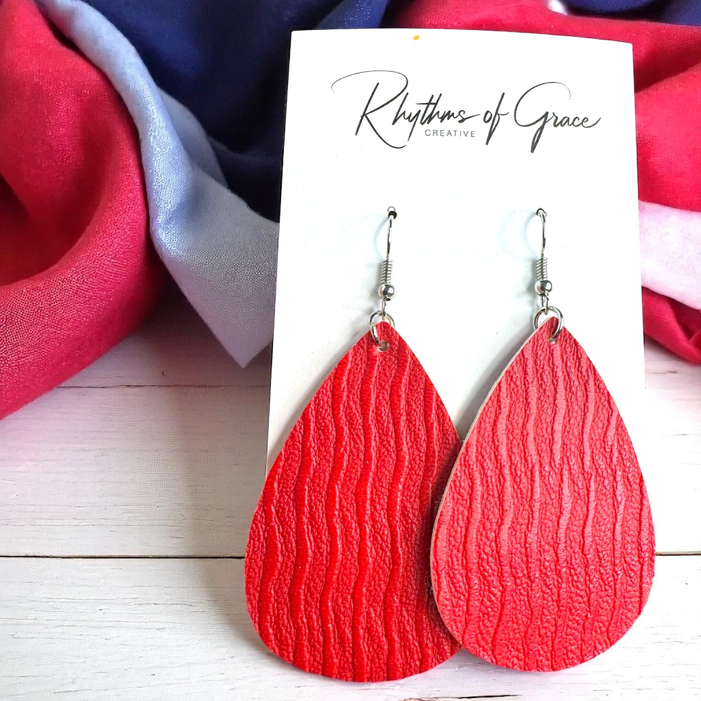 Teardrop Treasures: Red & Blue Faux Leather Dangle Earrings for Ultimate Style!