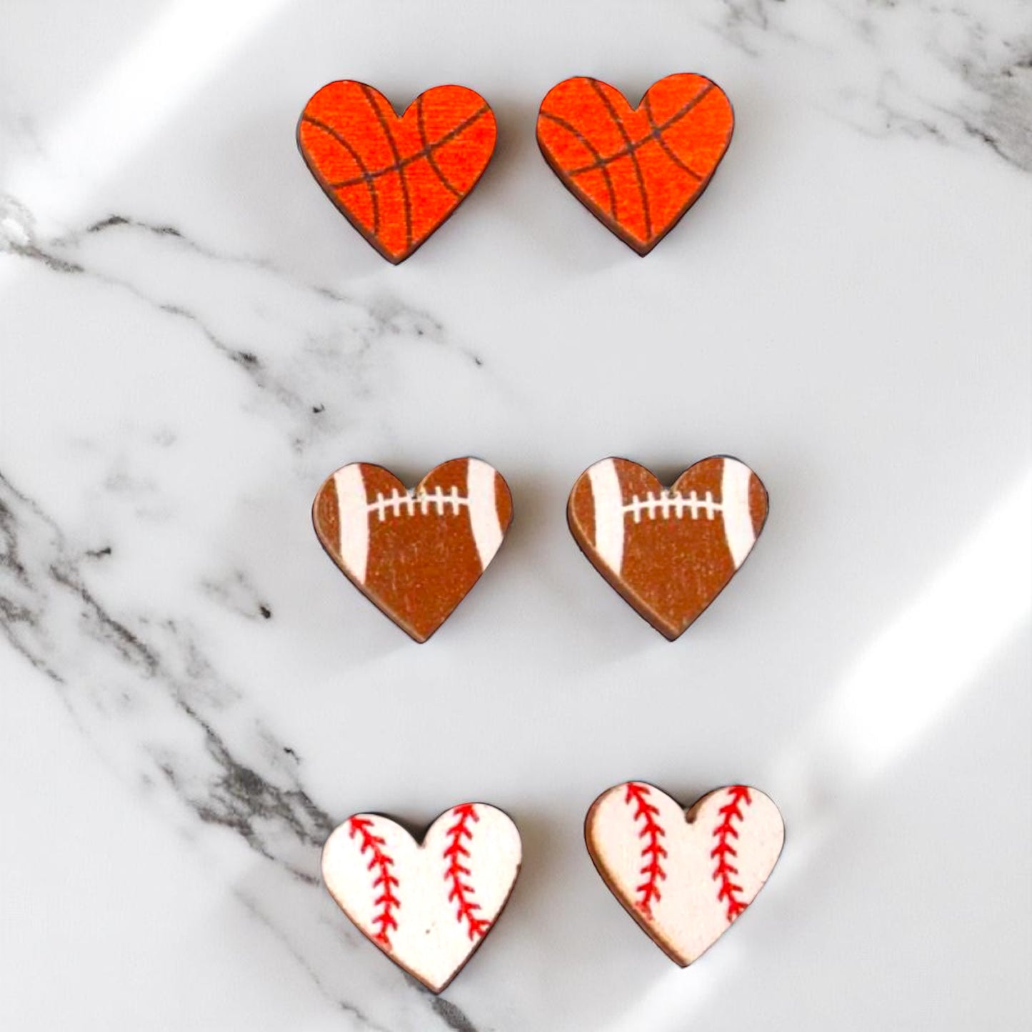 Score Style Points with Heart-Shaped Sports Stud Earrings!