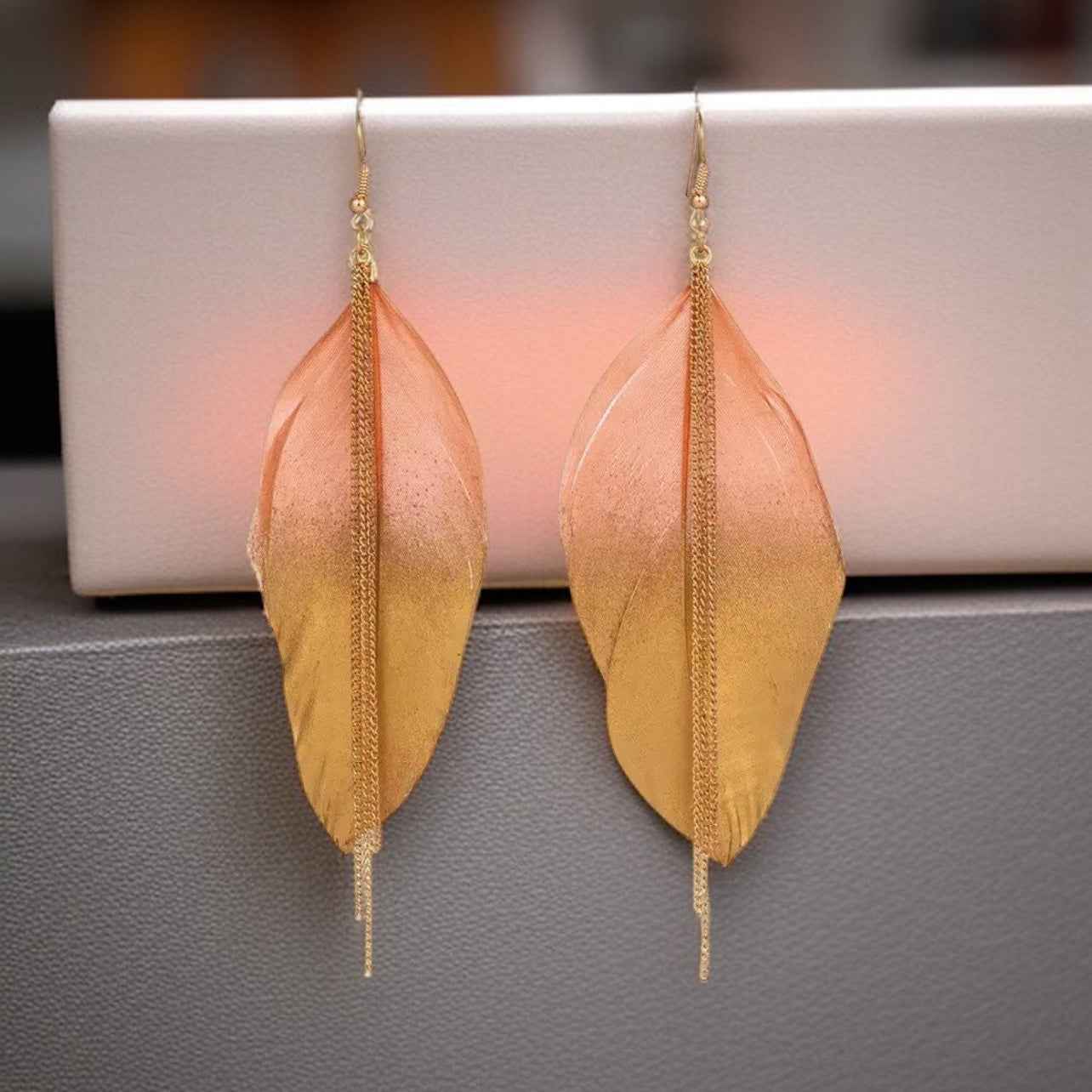 Gold Dipped Feather Earrings: Dance Into the Festivity!