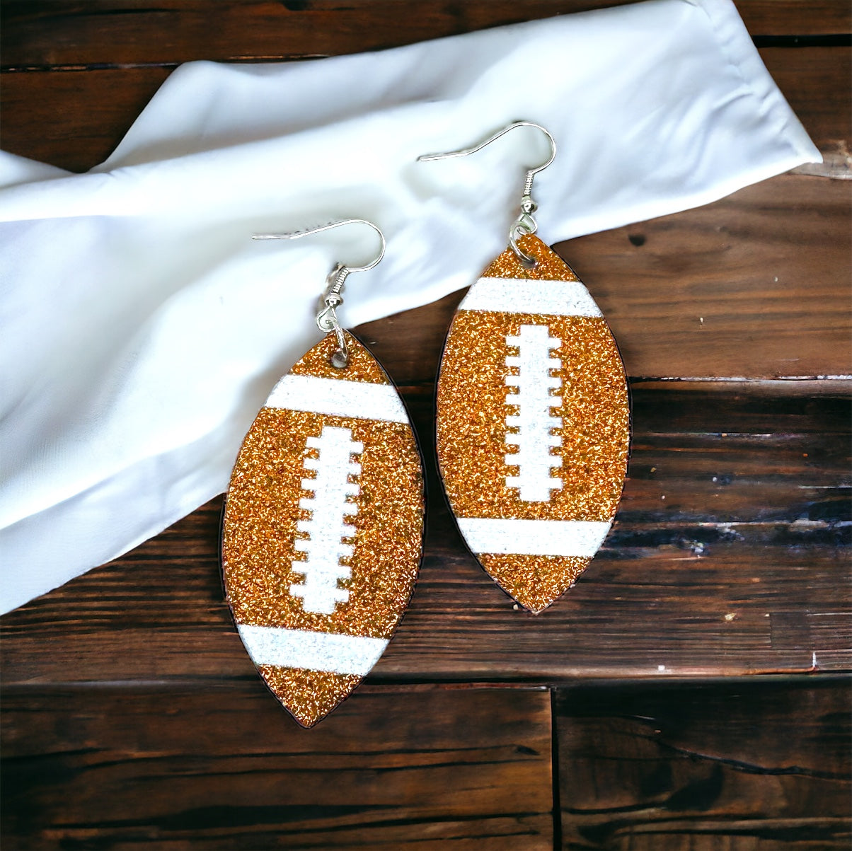 Kick Off Your Style: Stunning Football Dangle Earrings!
