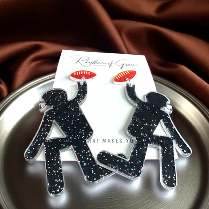 Touchdown Style: Football Player Dangle Earrings 🏈