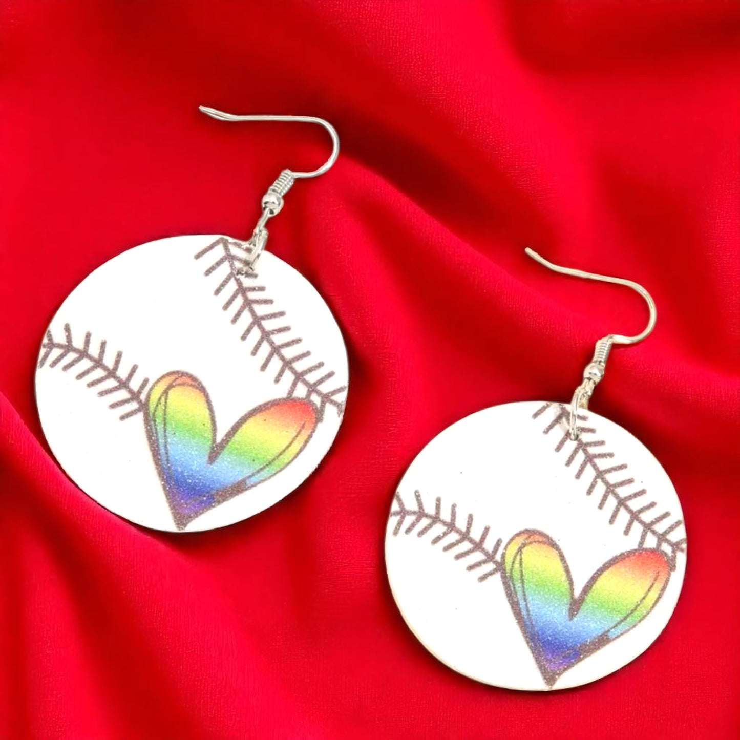 Swing into Style with Our Rainbow Heart Baseball Dangle Earrings! ⚾️🏳️‍🌈