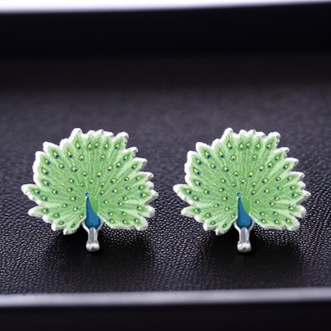 Peacock Pizzazz: Dazzling Studs for Every Style! 🦚