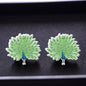Peacock Pizzazz: Dazzling Studs for Every Style! 🦚