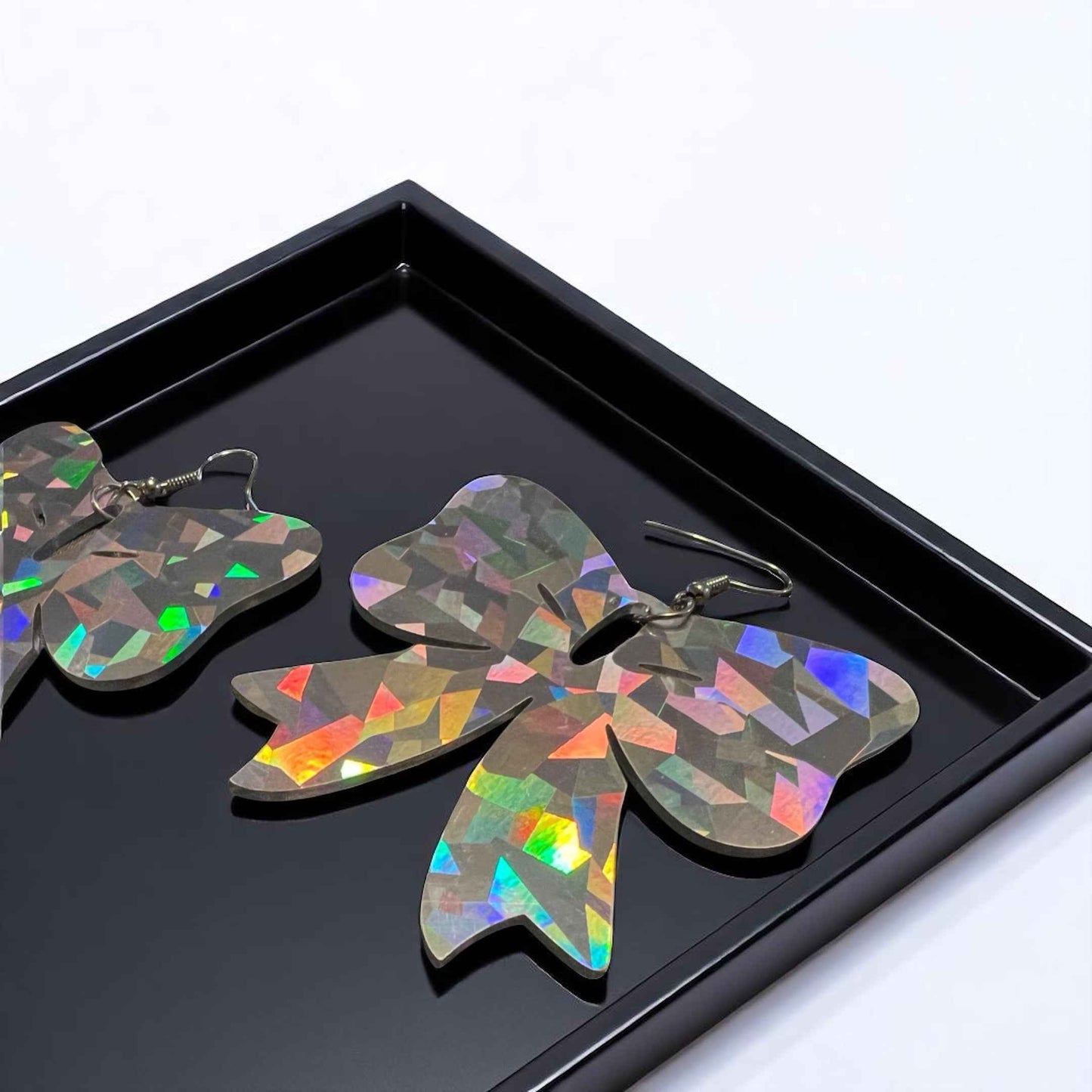 Sparkle & Spook: Holographic Bow Earrings for a Stunning Glam!