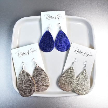 Sparkle & Shine: Metallic Teardrop Faux Leather Earrings! 🌟