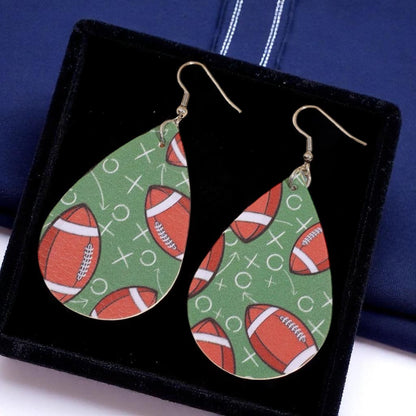Touchdown Style: Football Playbook Dangle Earrings 🏈