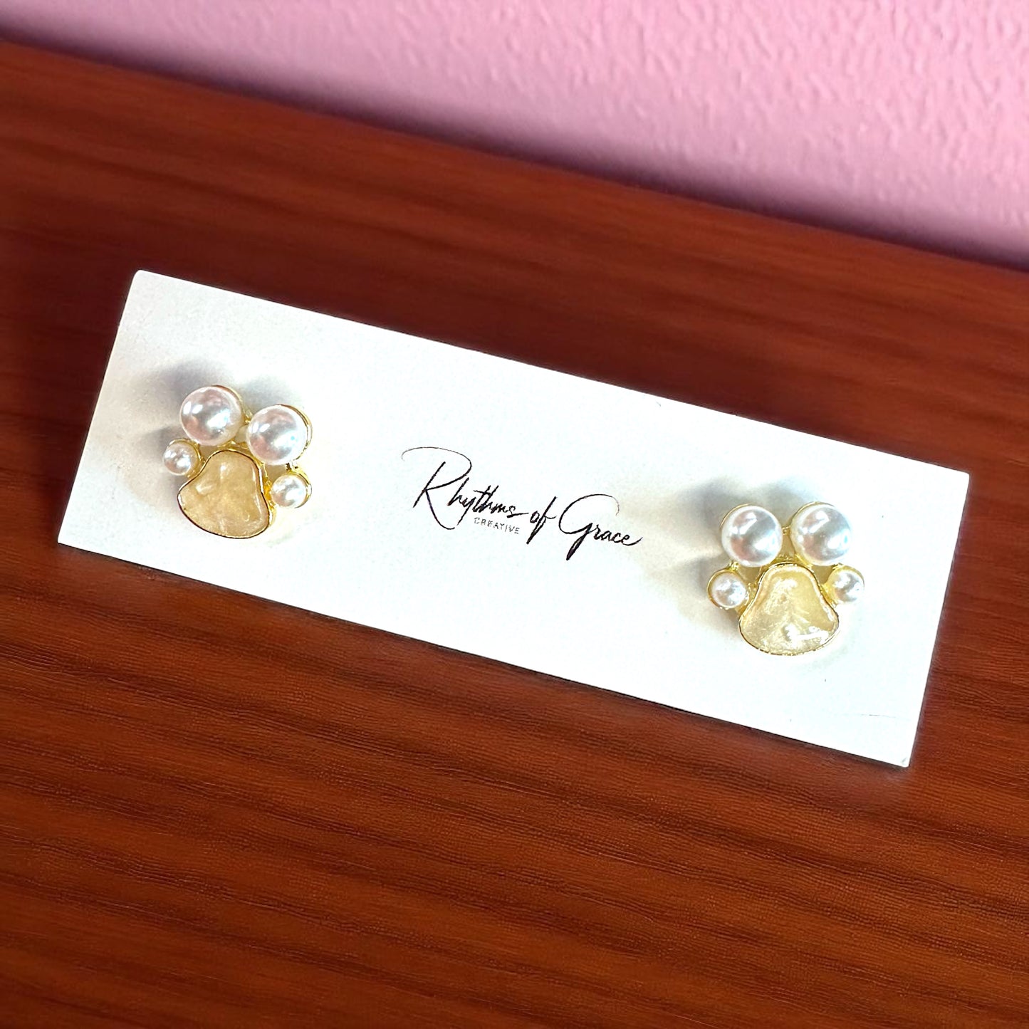 Sparkle with Style: Pearl Paw Print Stud Earrings! 🐾