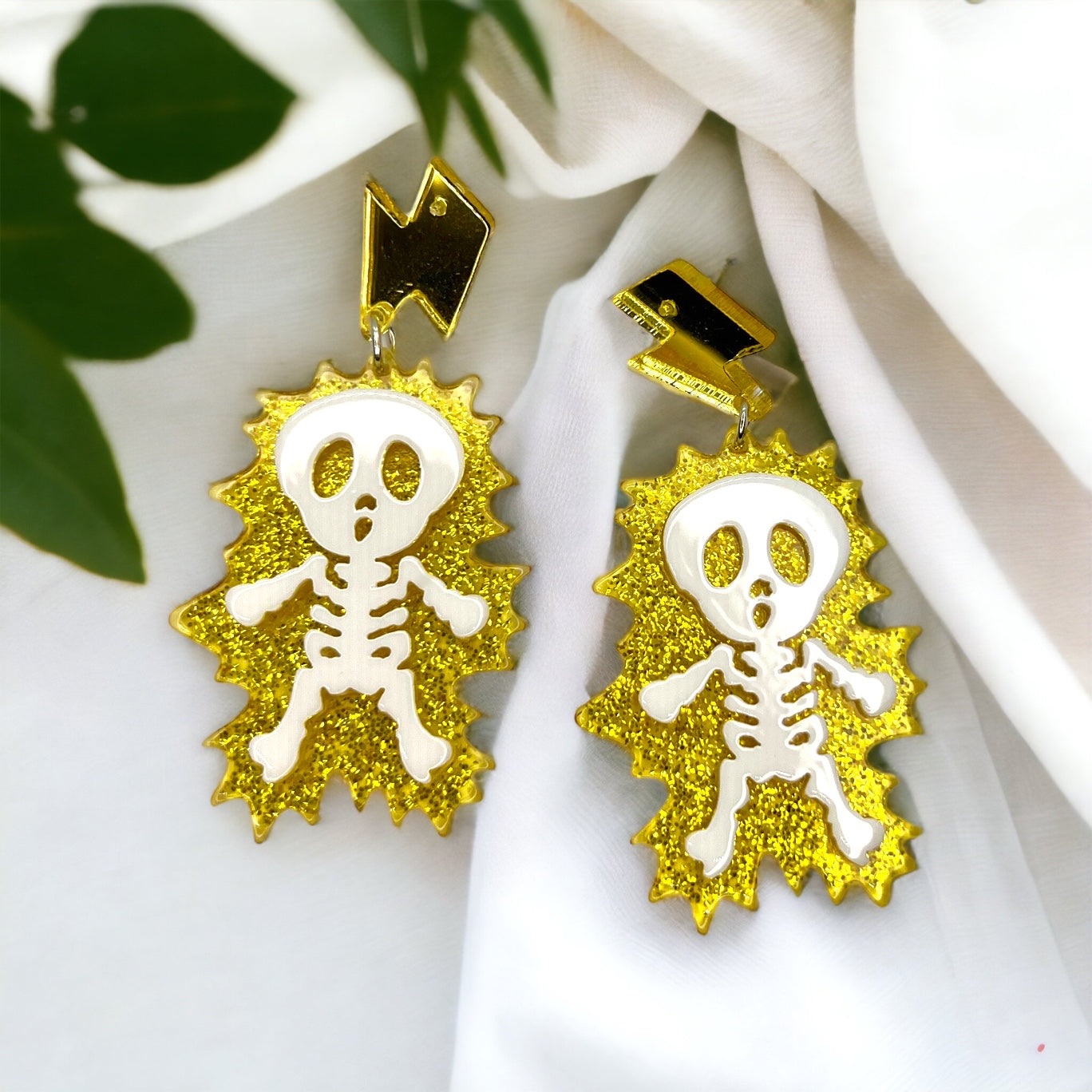 Electrify Your Look: Gold Electrocuted Skeleton Dangle Earrings for a Spook-tacular Style! - Rhythms of Grace Creative