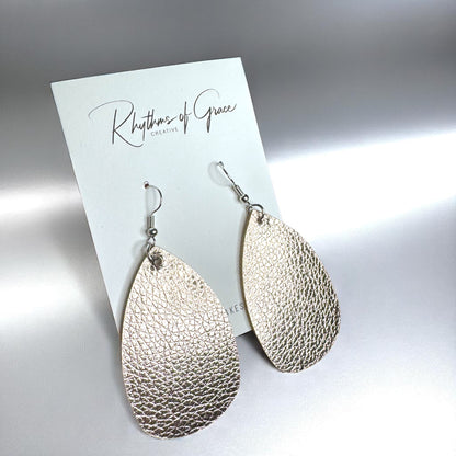 Sparkle & Shine: Metallic Teardrop Faux Leather Earrings! 🌟