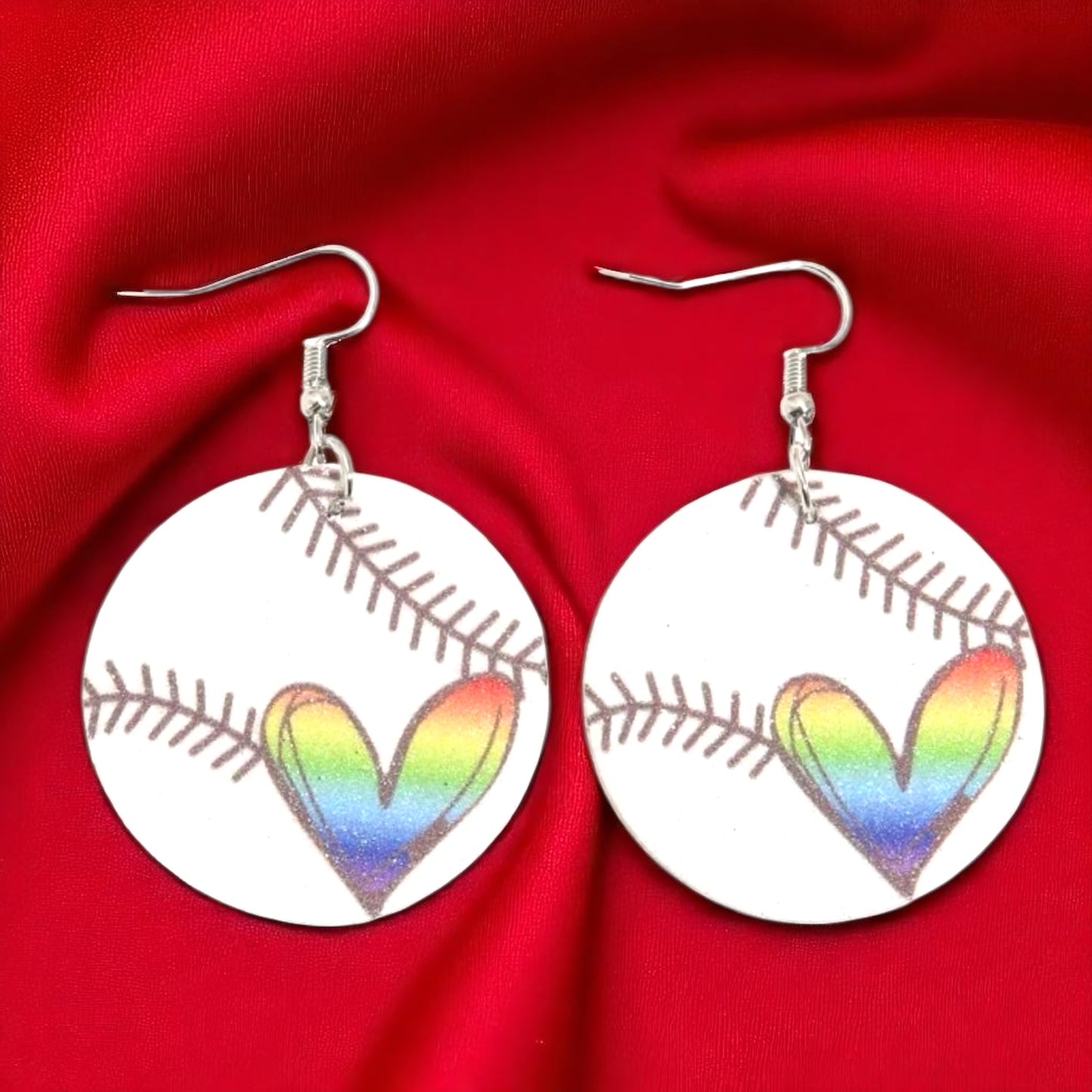 Swing into Style with Our Rainbow Heart Baseball Dangle Earrings! ⚾️🏳️‍🌈