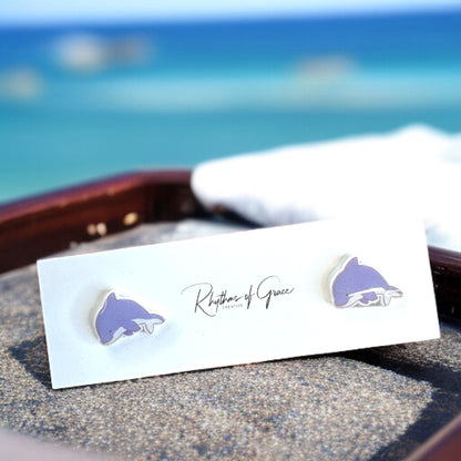 Make a Splash with Purple Dolphin Stud Earrings!