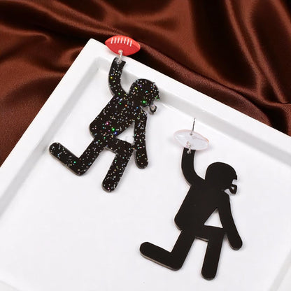 Touchdown Style: Football Player Dangle Earrings 🏈
