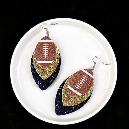 Touchdown in Style: Black and Gold Football Earrings for the Fashion-Forward Fan!