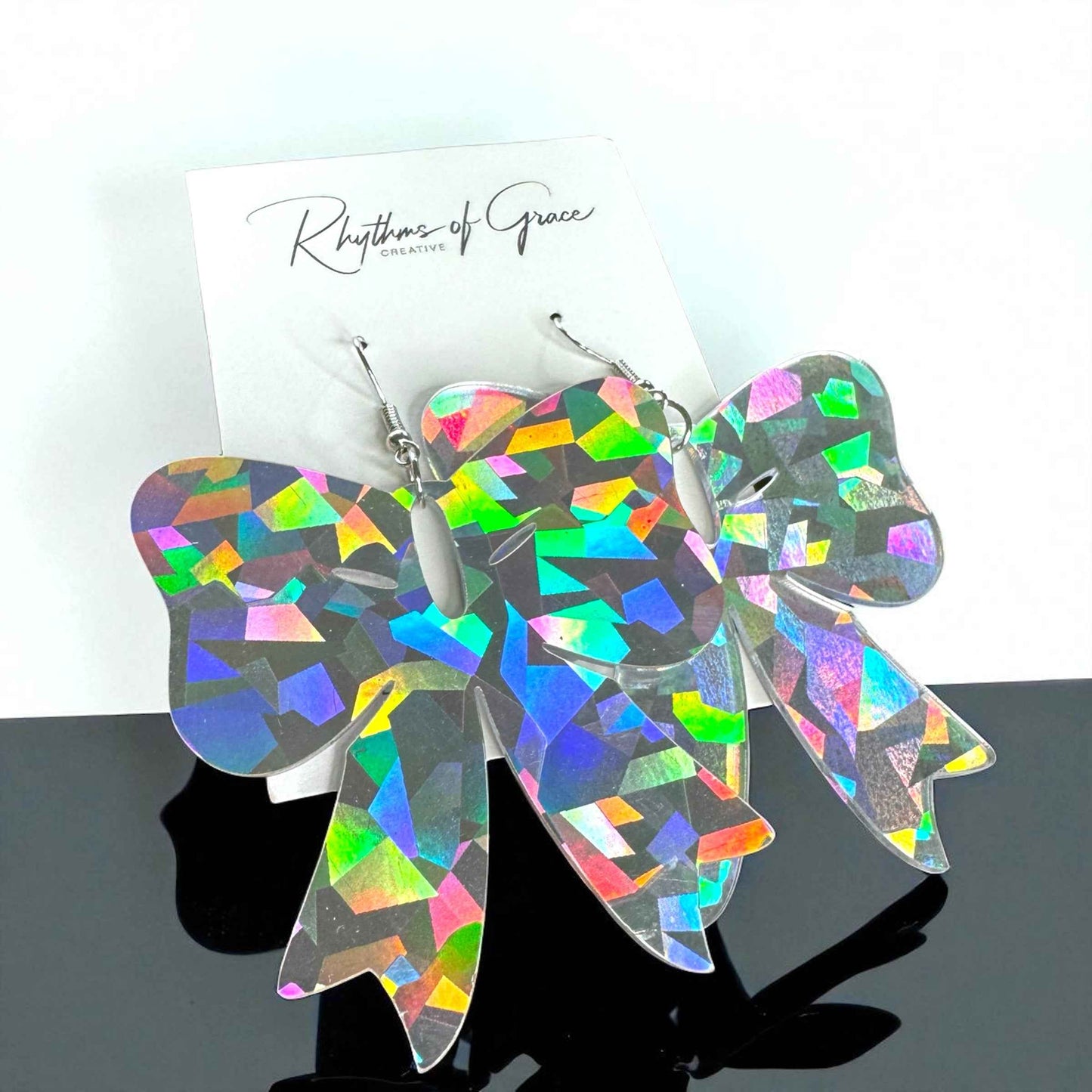 Sparkle & Spook: Holographic Bow Earrings for a Stunning Glam!