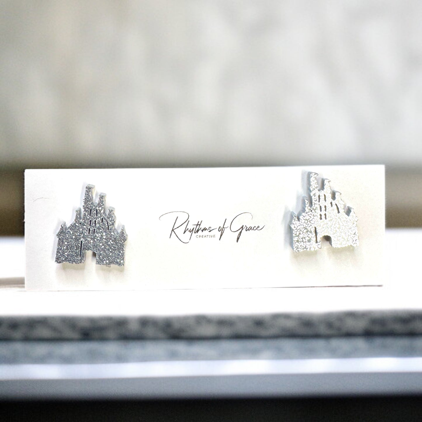 Sparkle Like a Princess: Glitter Cinderella Castle Earrings for Your Royal Ears!