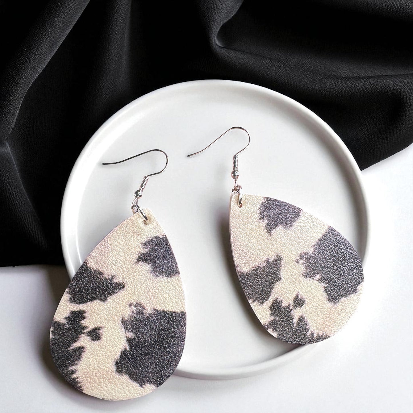 Cow Print Teardrop Earrings – Chic, Cowgirl, & Totally Rodeo Ready!