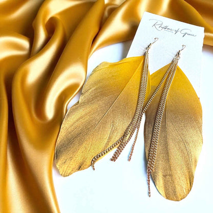 Gold Dipped Feather Earrings: Dance Into the Festivity!