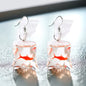Splash of Charm: Carnival Goldfish Earrings