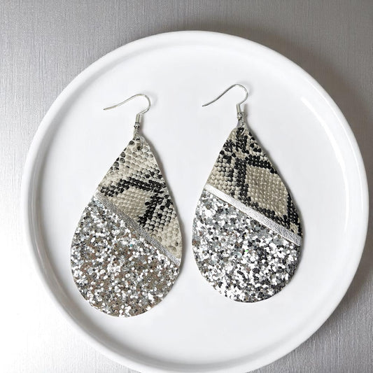 Slither in Style with Our Snake Print Teardrop Dangle Earrings! 🐍