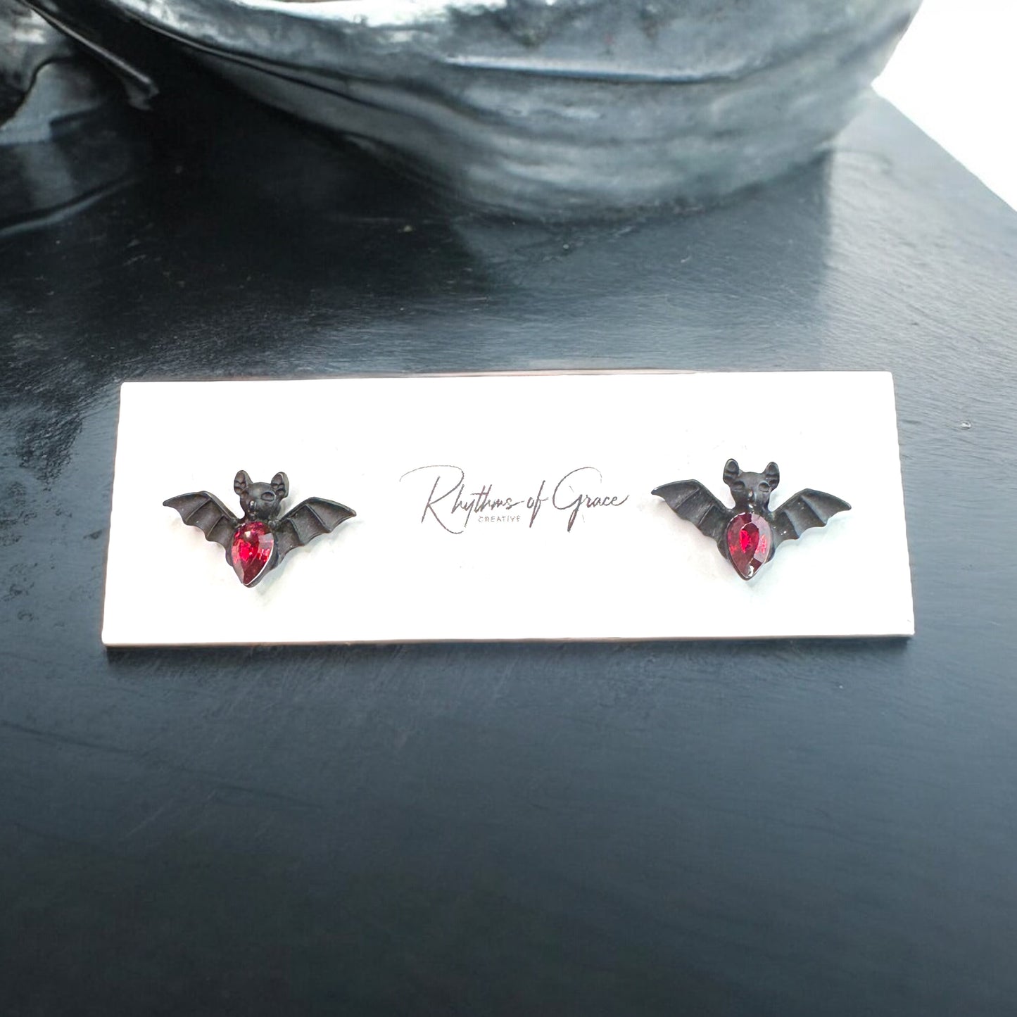 Bat-tastic Bling: Red & Black Rhinestone Stud Earrings!