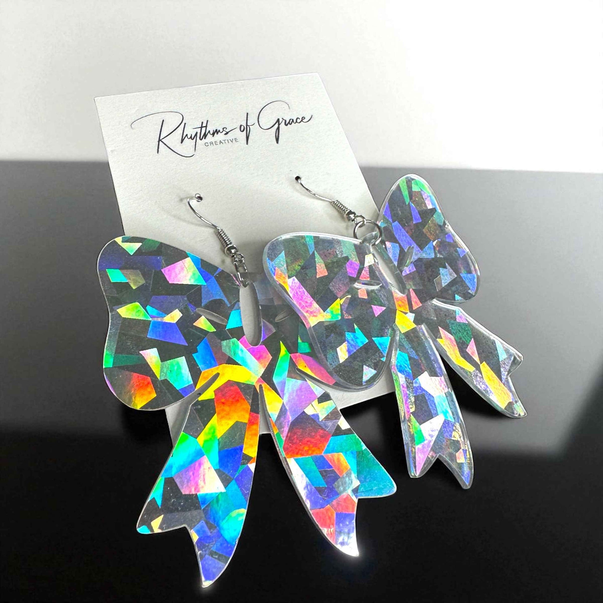 Sparkle & Spook: Holographic Bow Earrings for a Stunning Glam!