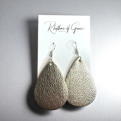Sparkle & Shine: Metallic Teardrop Faux Leather Earrings! 🌟