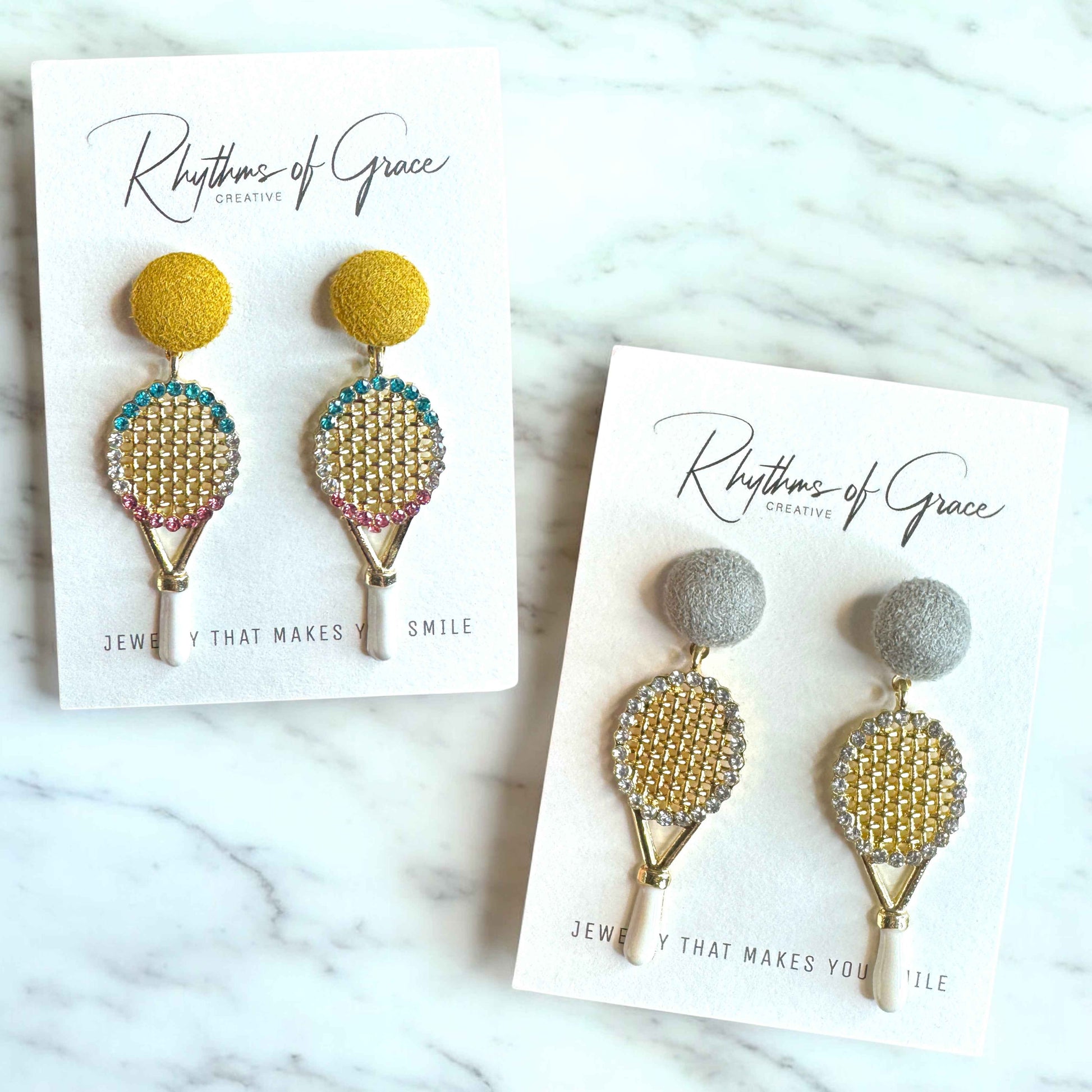Sparkle on the Court with Our Rhinestone Tennis Racket Dangle Earrings! 🎾