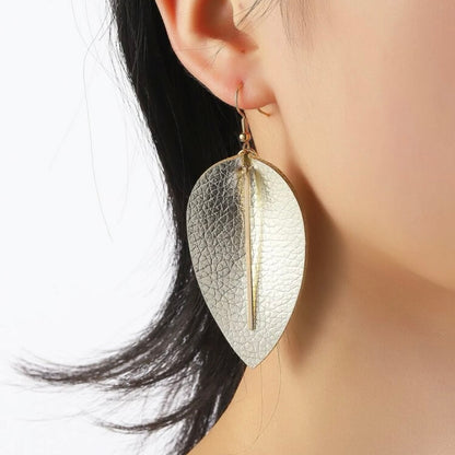 Glamorous Gold Teardrop Earrings with Charm Accent - Elevate Your Style!