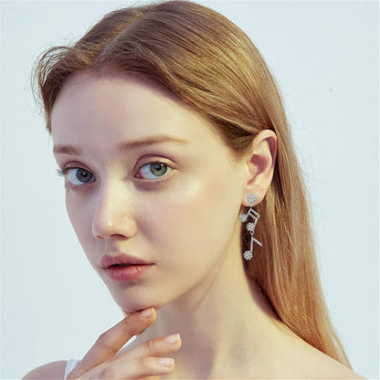 Sparkle & Shine: Rhinestone Musical Notes Dangle Earrings 🎶