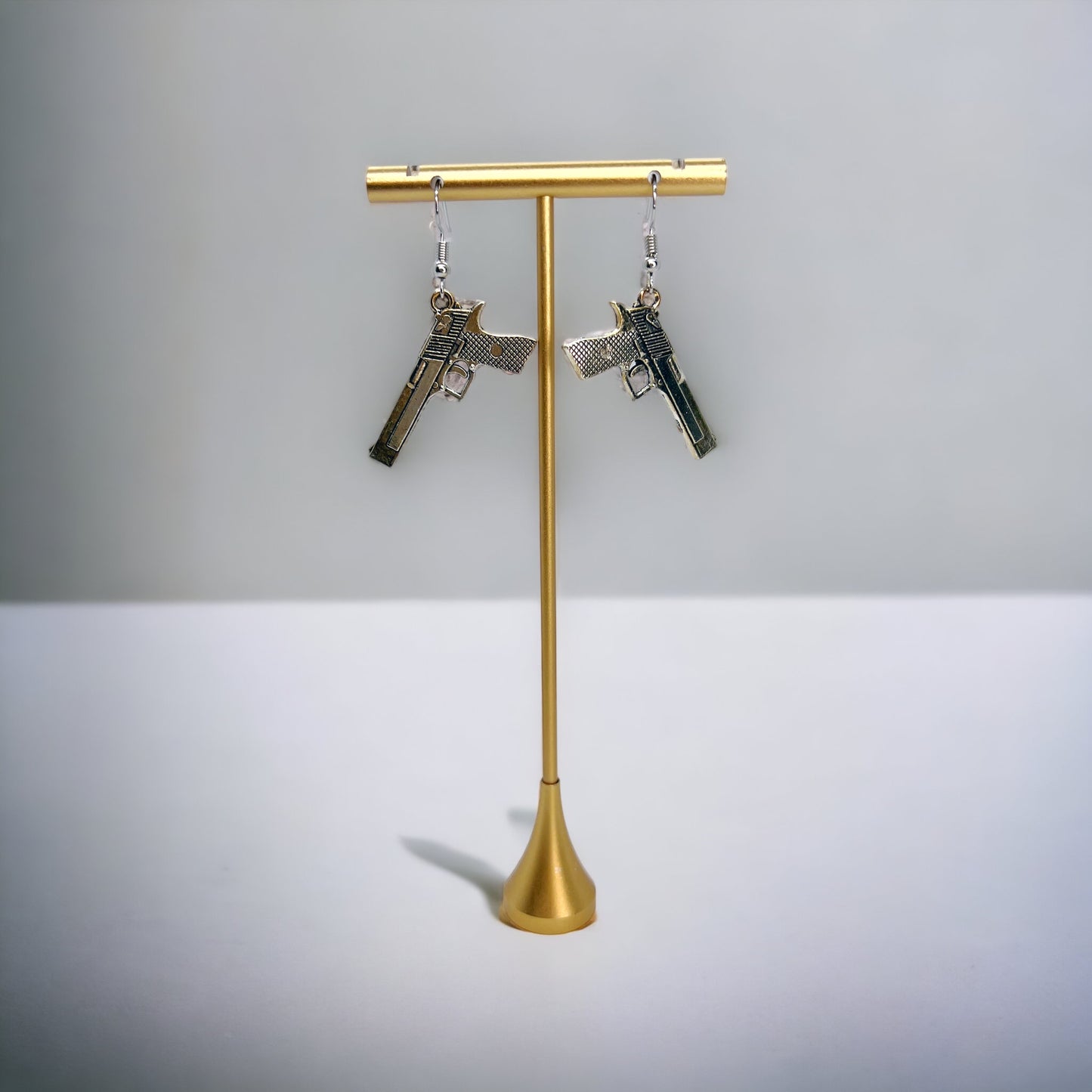 Handgun Earrings: Edgy Elegance for the Bold! - Rhythms of Grace Creative