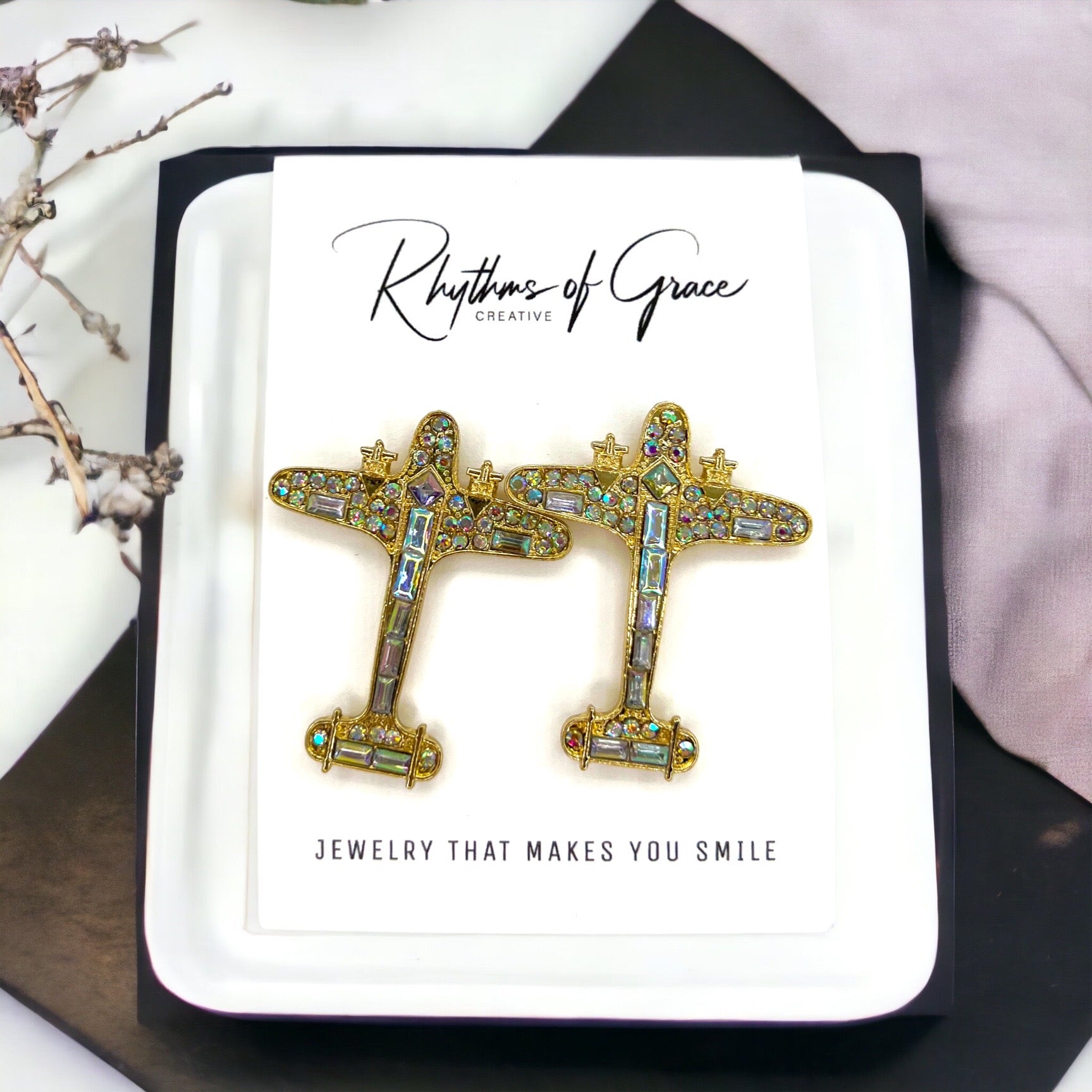 Jet, Set, Sparkle – Rhinestone Airplane Earrings for the Glam Globetrotter ✈️ - Rhythms of Grace Creative
