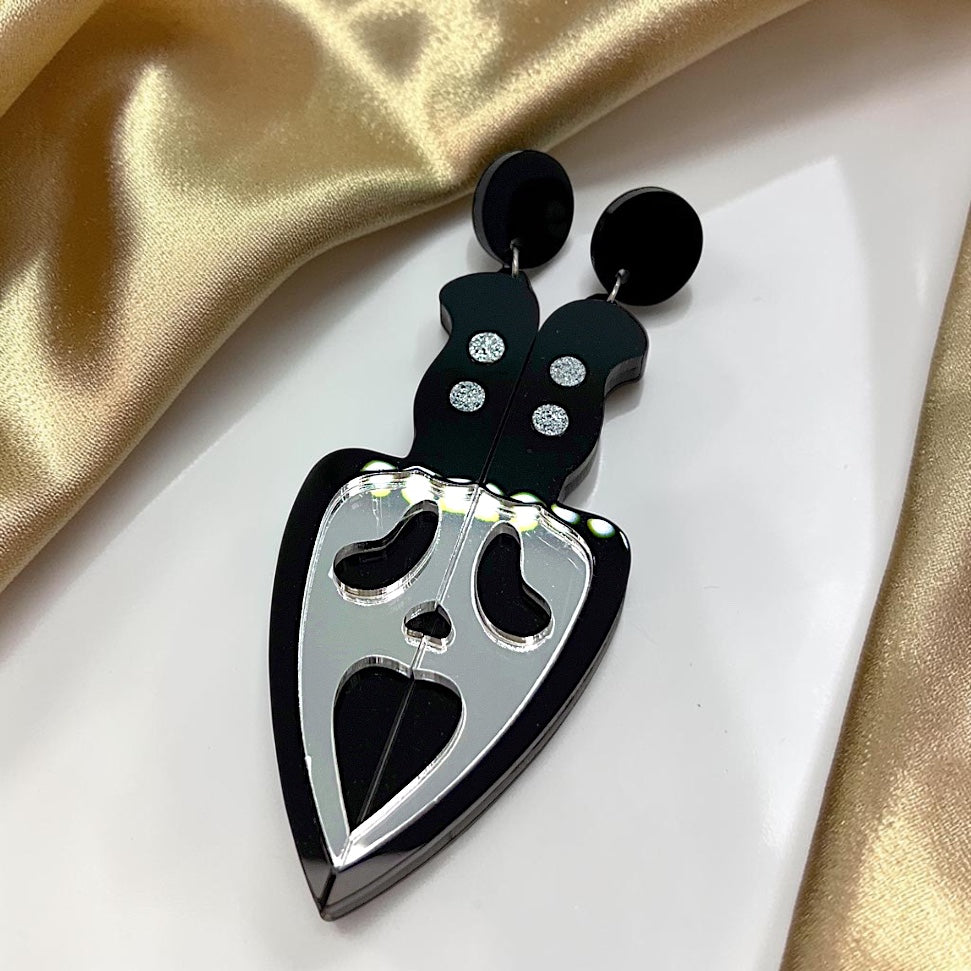 Slice Into Style: True Crime Halloween Earrings Collection!