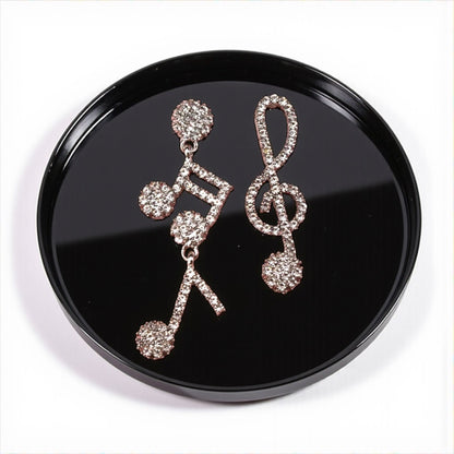 Sparkle & Shine: Rhinestone Musical Notes Dangle Earrings 🎶
