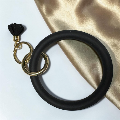 Midnight Luxe Silicone Bangle Keychain Bracelet – Black & Gold Tassel Wristlet