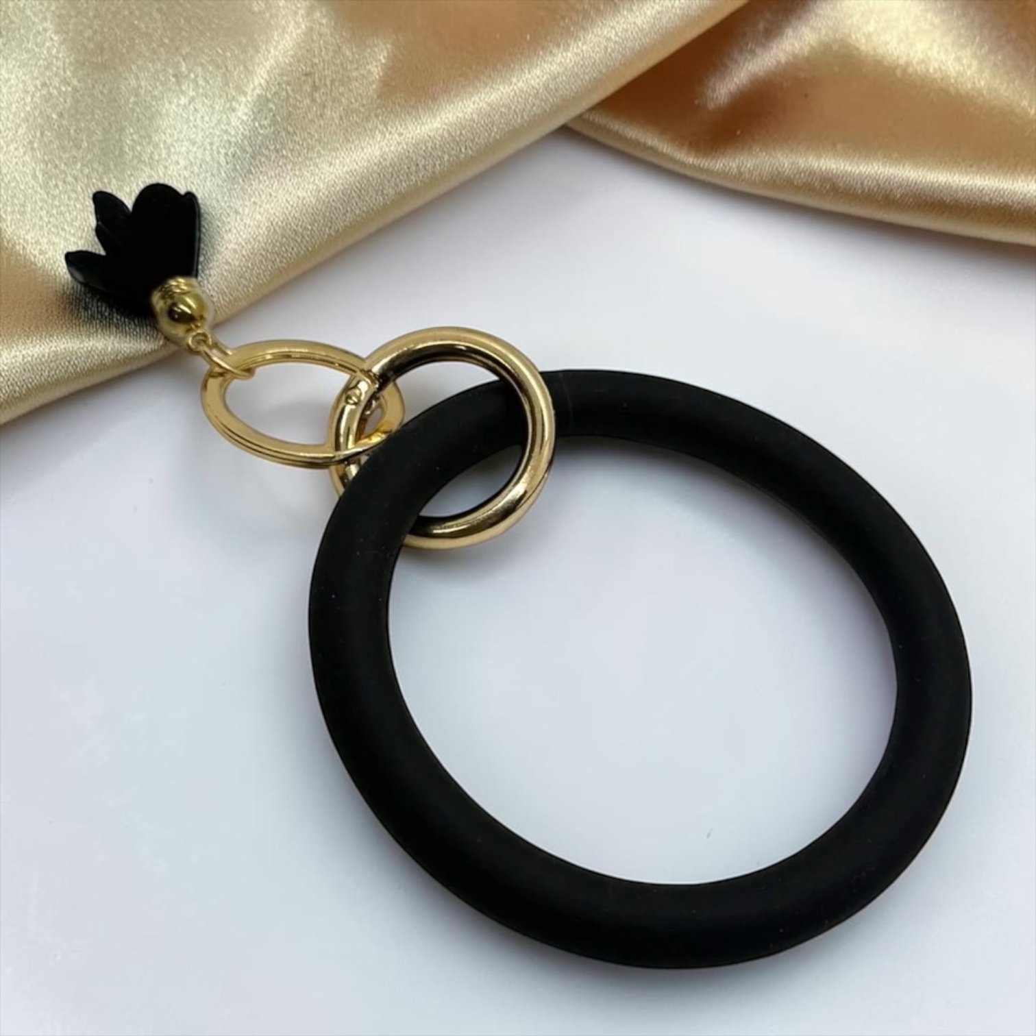 Midnight Luxe Silicone Bangle Keychain Bracelet – Black & Gold Tassel Wristlet