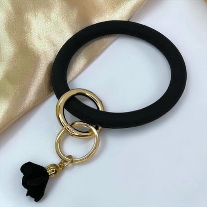 Midnight Luxe Silicone Bangle Keychain Bracelet – Black & Gold Tassel Wristlet