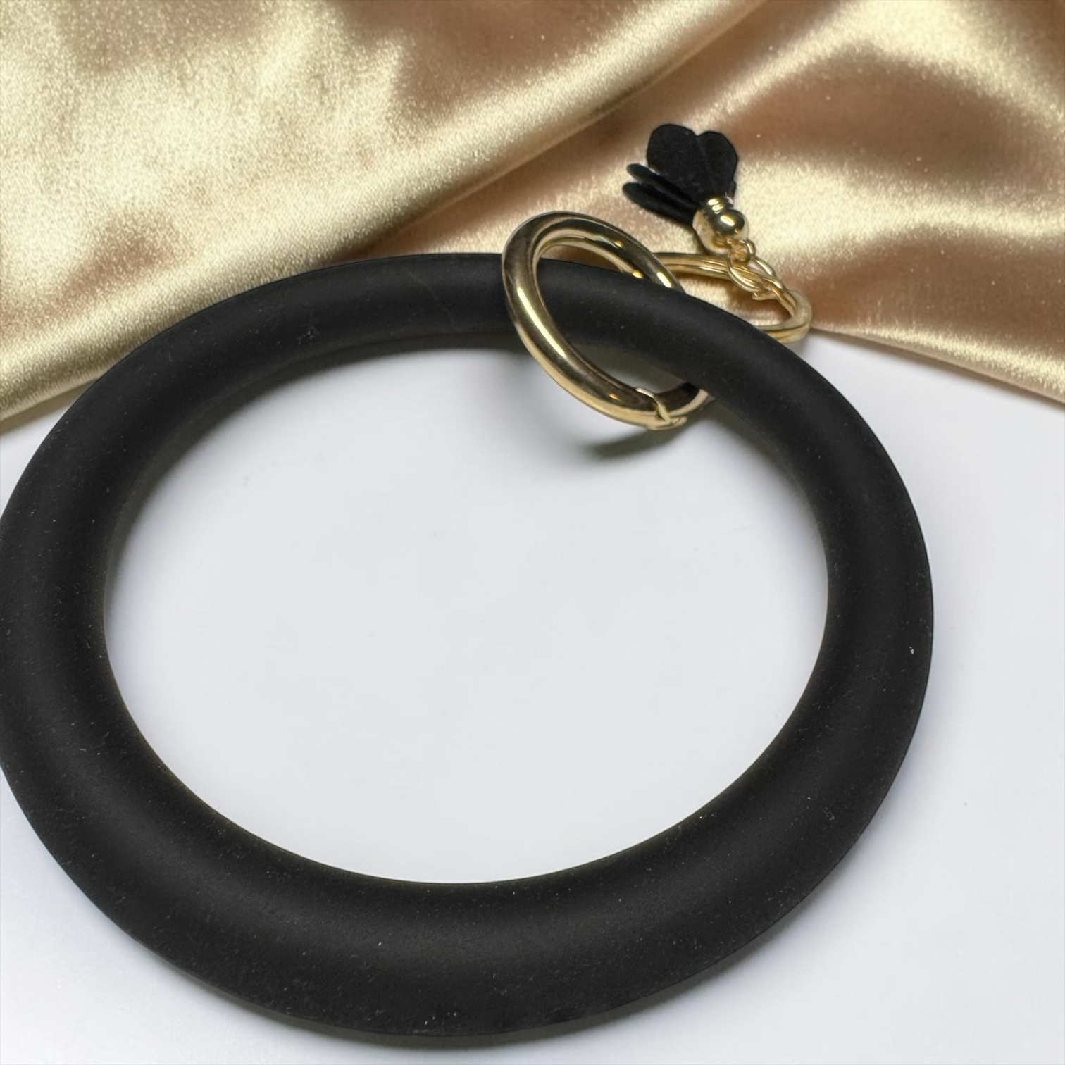 Midnight Luxe Silicone Bangle Keychain Bracelet – Black & Gold Tassel Wristlet