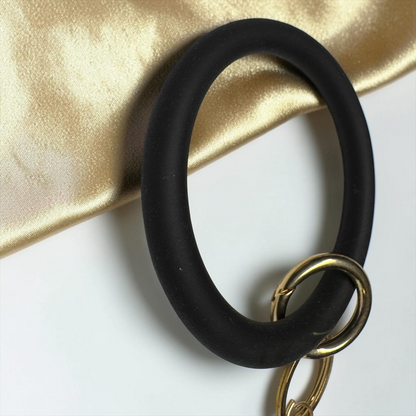 Midnight Luxe Silicone Bangle Keychain Bracelet – Black & Gold Tassel Wristlet