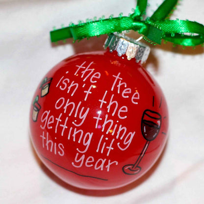 Christmas Ornament: "The tree isn't the only thing getting lit this year."