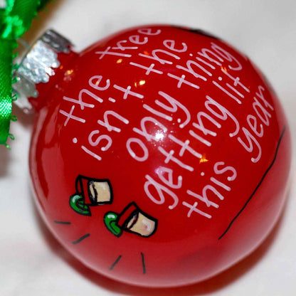 Christmas Ornament: "The tree isn't the only thing getting lit this year."