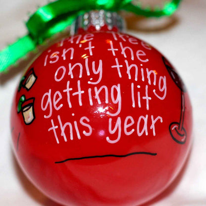 Christmas Ornament: "The tree isn't the only thing getting lit this year."