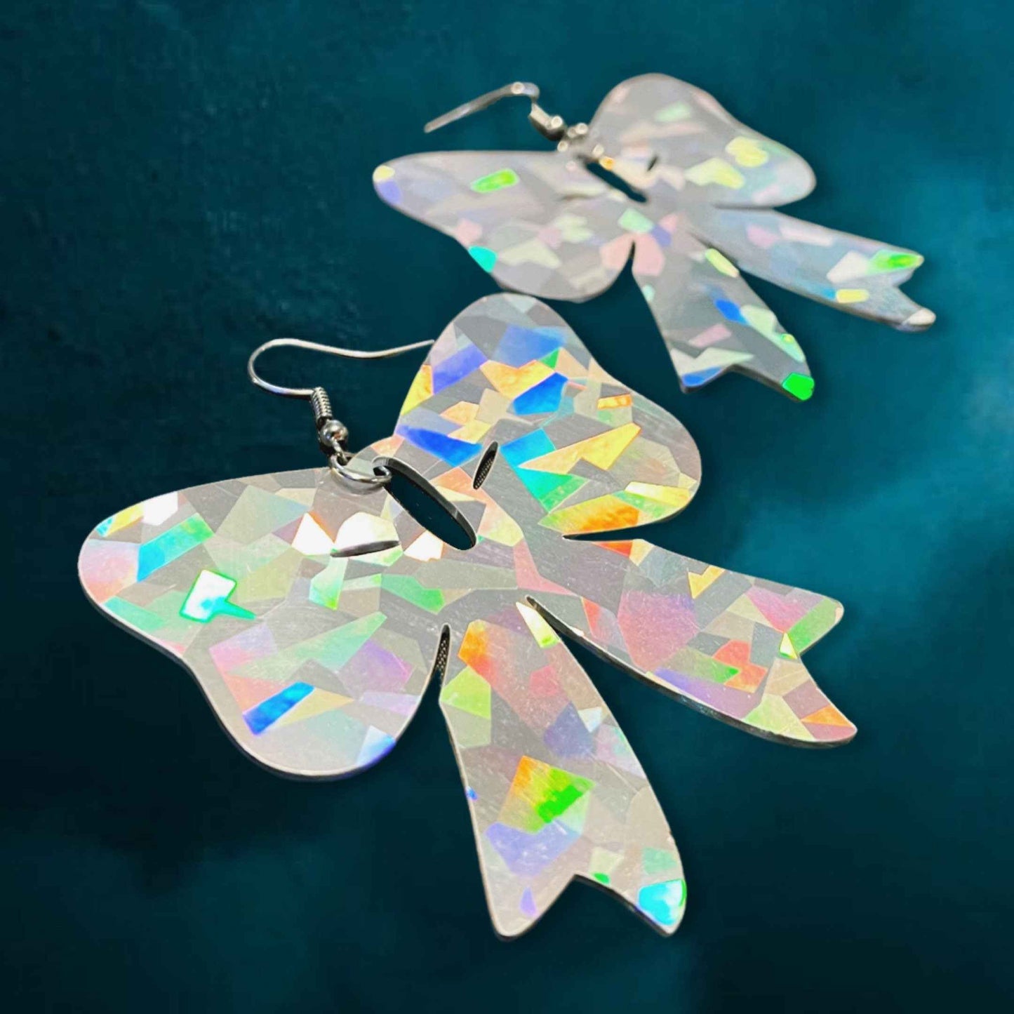 Sparkle & Spook: Holographic Bow Earrings for a Stunning Glam!