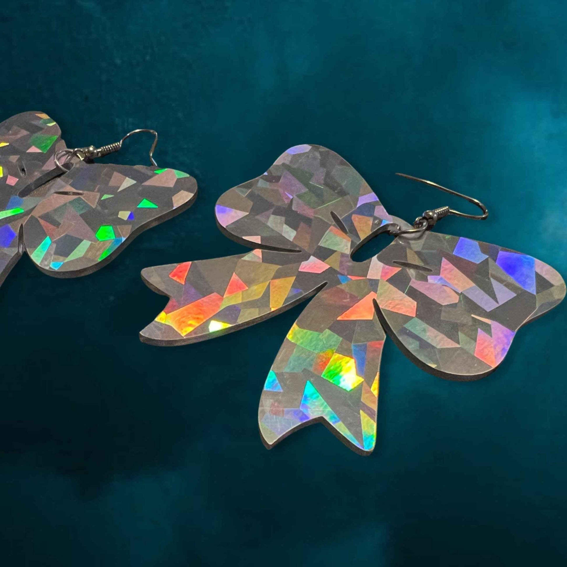 Sparkle & Spook: Holographic Bow Earrings for a Stunning Glam!